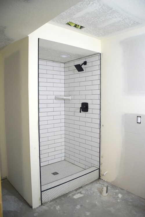 Small bathroom with shower stall