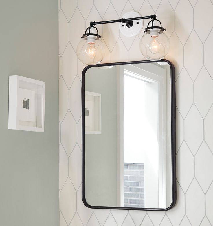 Bathroom sconces above mirror