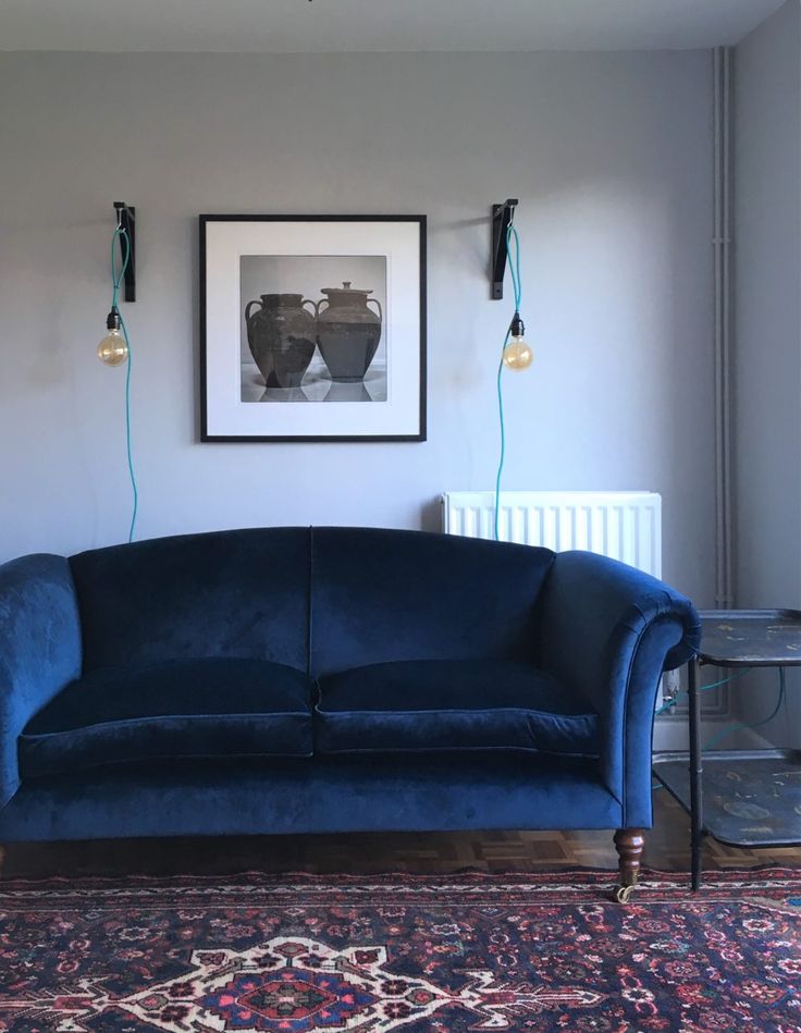 Living rooms with navy blue sofas