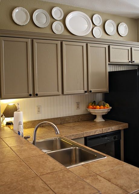 How much to restain kitchen cabinets