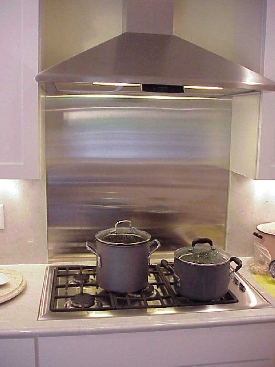 Metal backsplash in kitchen