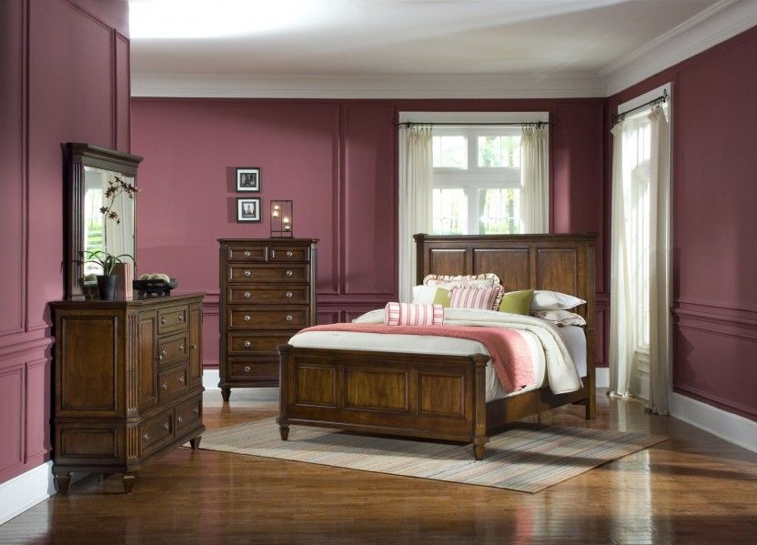 Bedrooms with dark wood furniture